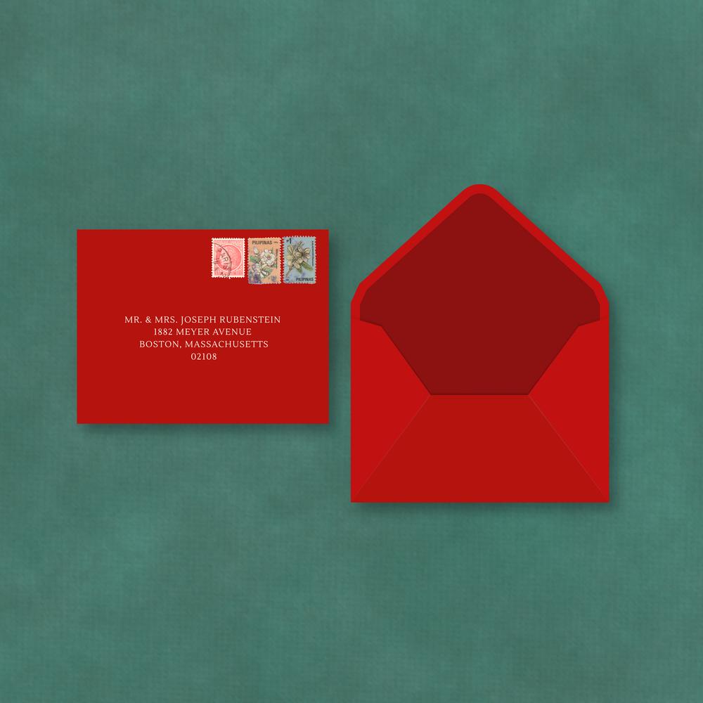 Bright red envelope liner and invitation card featuring architectural sketches on green.